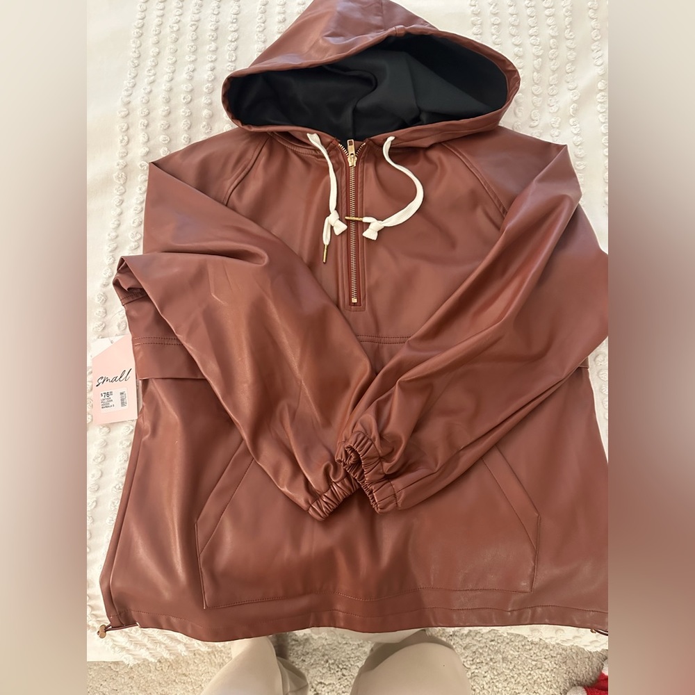 Brown leather pullover from Elle Gray boutique.
